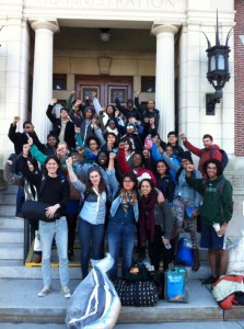 The student protestors celebrate the end of the sit-in on the steps of Parkhurst Thursday afternoon.