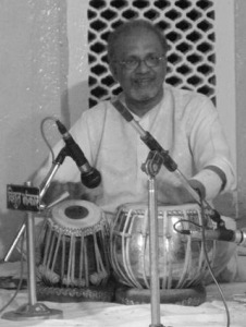 Mr. Ramu Pandit playing the tabla at a prior performance.