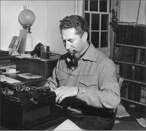 Schulberg hard at work on his typewriter. 