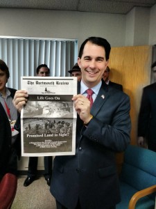 Wisconsin Governor Scott Walker with some light reading at the First in the Nation Summit