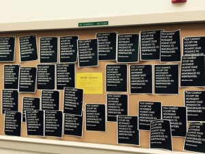 May 2016: Black Lives Matter members deface a bulletin board honoring fallen police officers in Collis Hall.